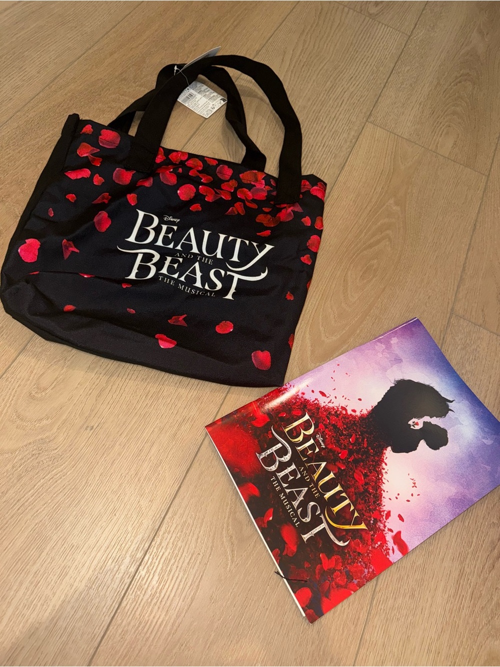 Beauty and the beast Black Tote Bag with Red Petal Print